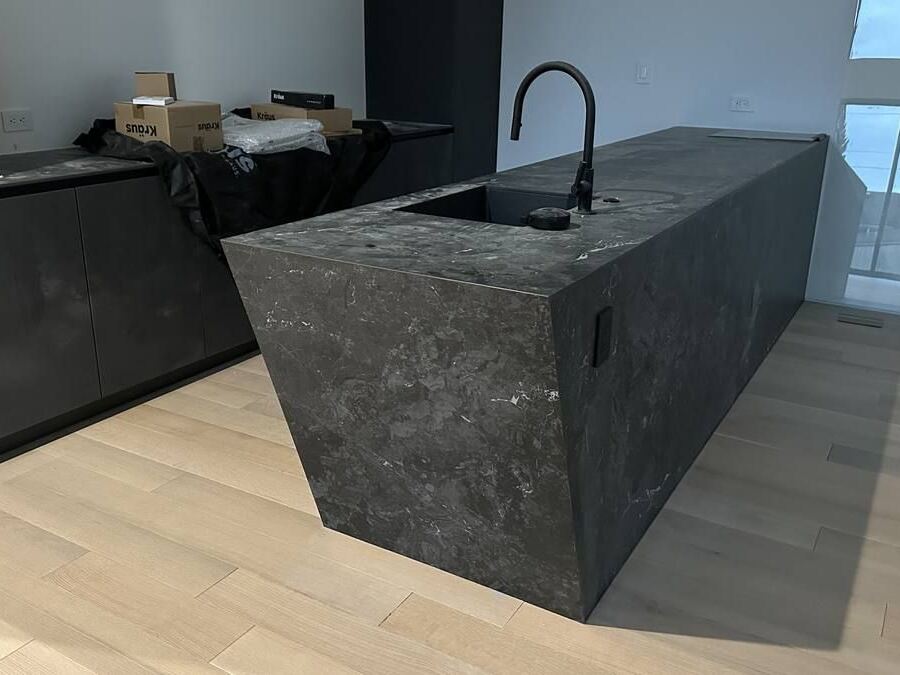 Dekton porcelain full-wrap peninsula with angle-mitered waterfall, Mercer Island WA