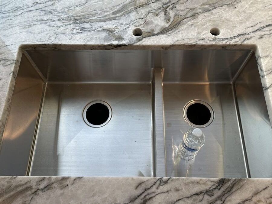 Undermount sink set into a quartzite island