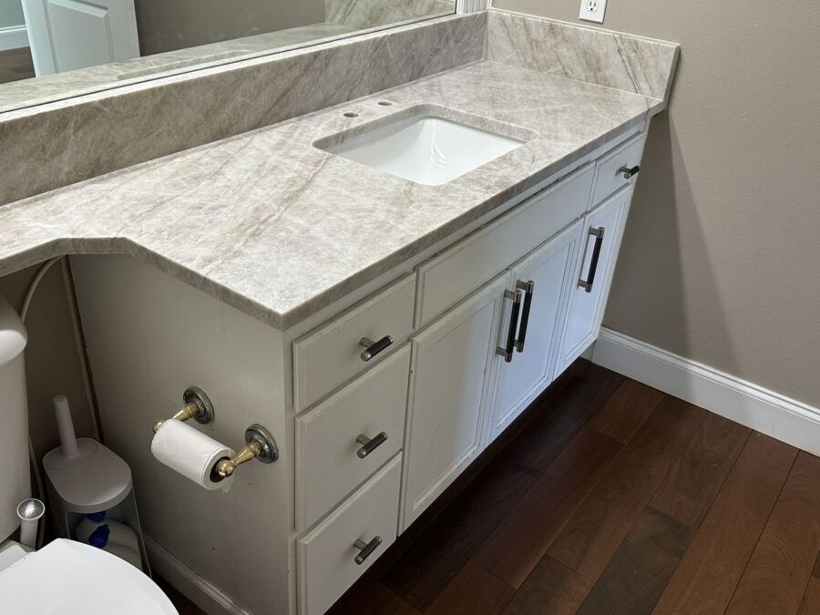 Quartzite vanity run with a return, fabricated by Custom Touch Granite